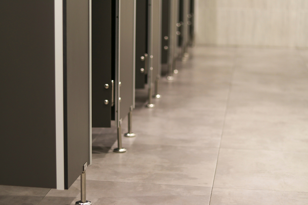 Rows of Bathroom Stalls in a Facility